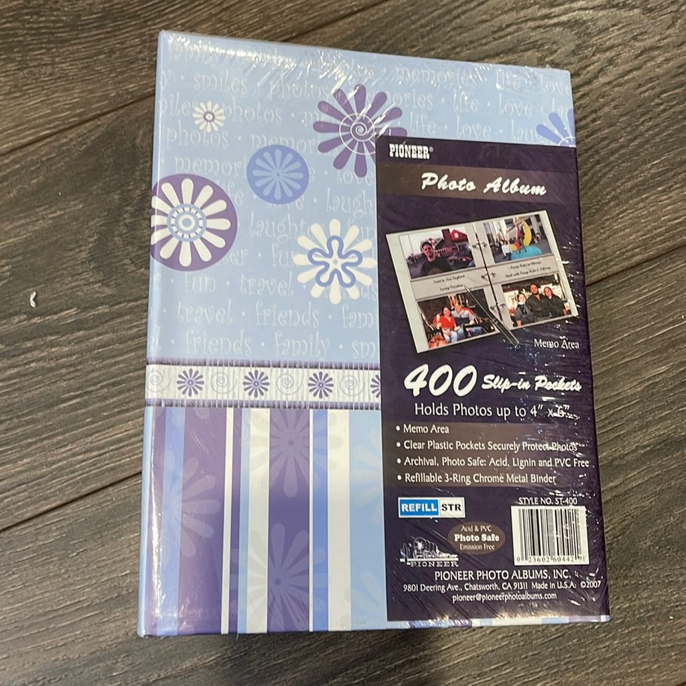 Photo Album. Made by Pioneer. Holds up to 4x6 photos. Slip-in pockets